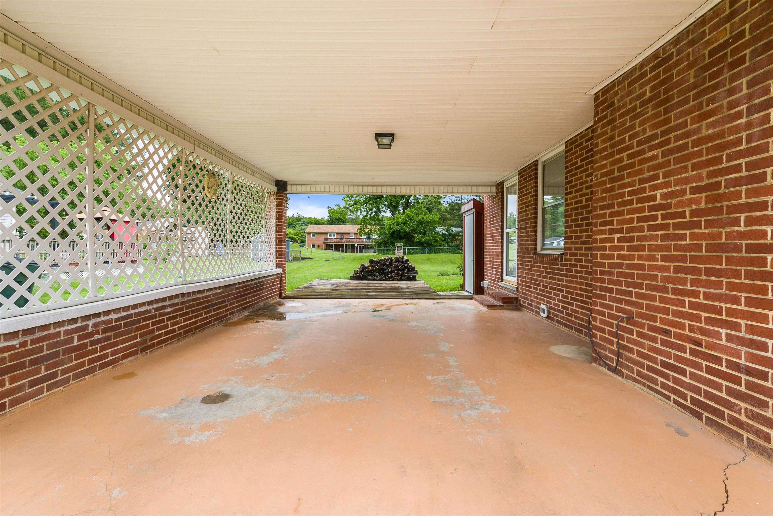 78 Stuart Avenue Stuarts Draft, VA 24477 - Photo 4 of 41 a view of a garden with an outdoor space