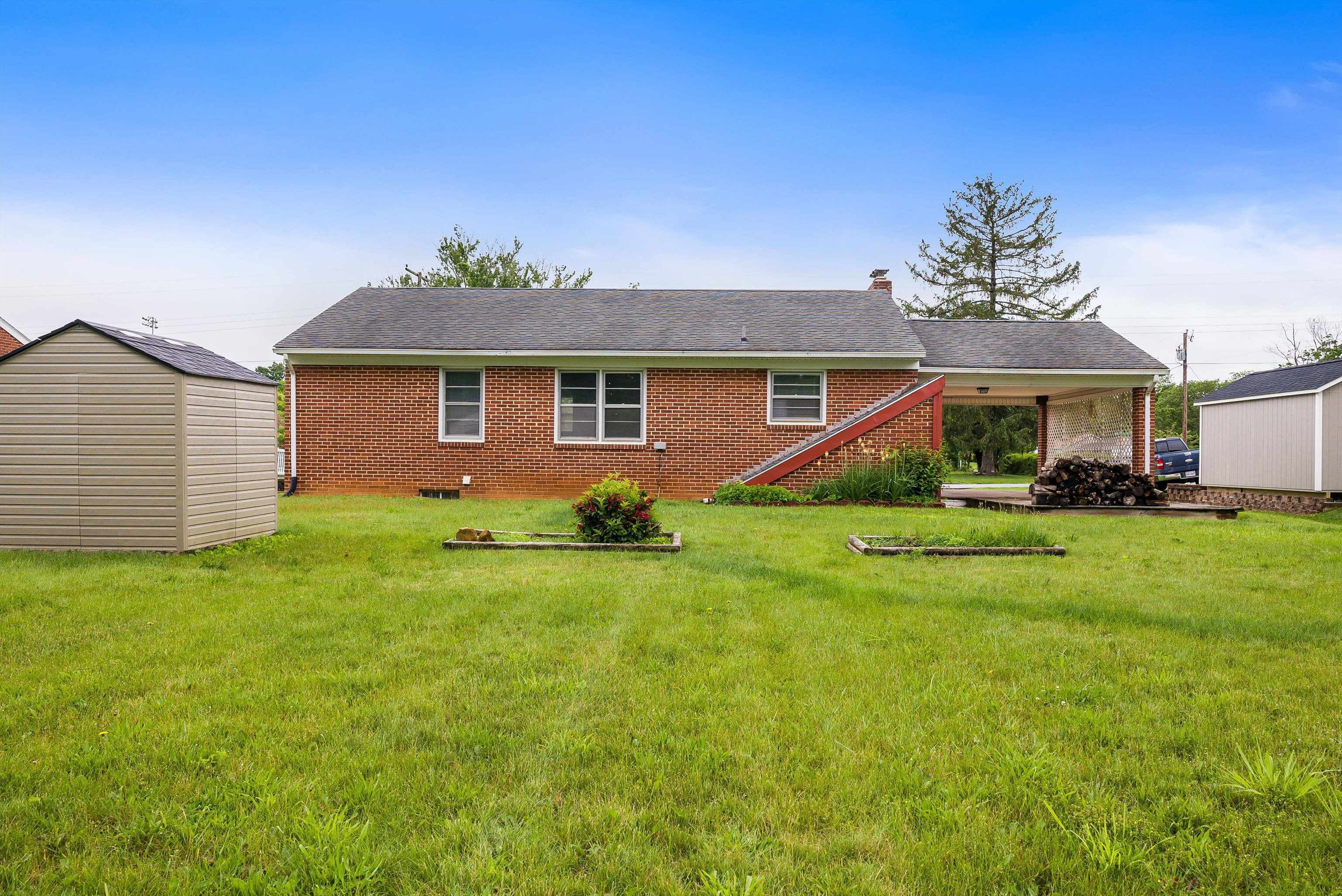 78 Stuart Avenue Stuarts Draft, VA 24477 - Photo 41 of 41 a front view of house with yard and green space