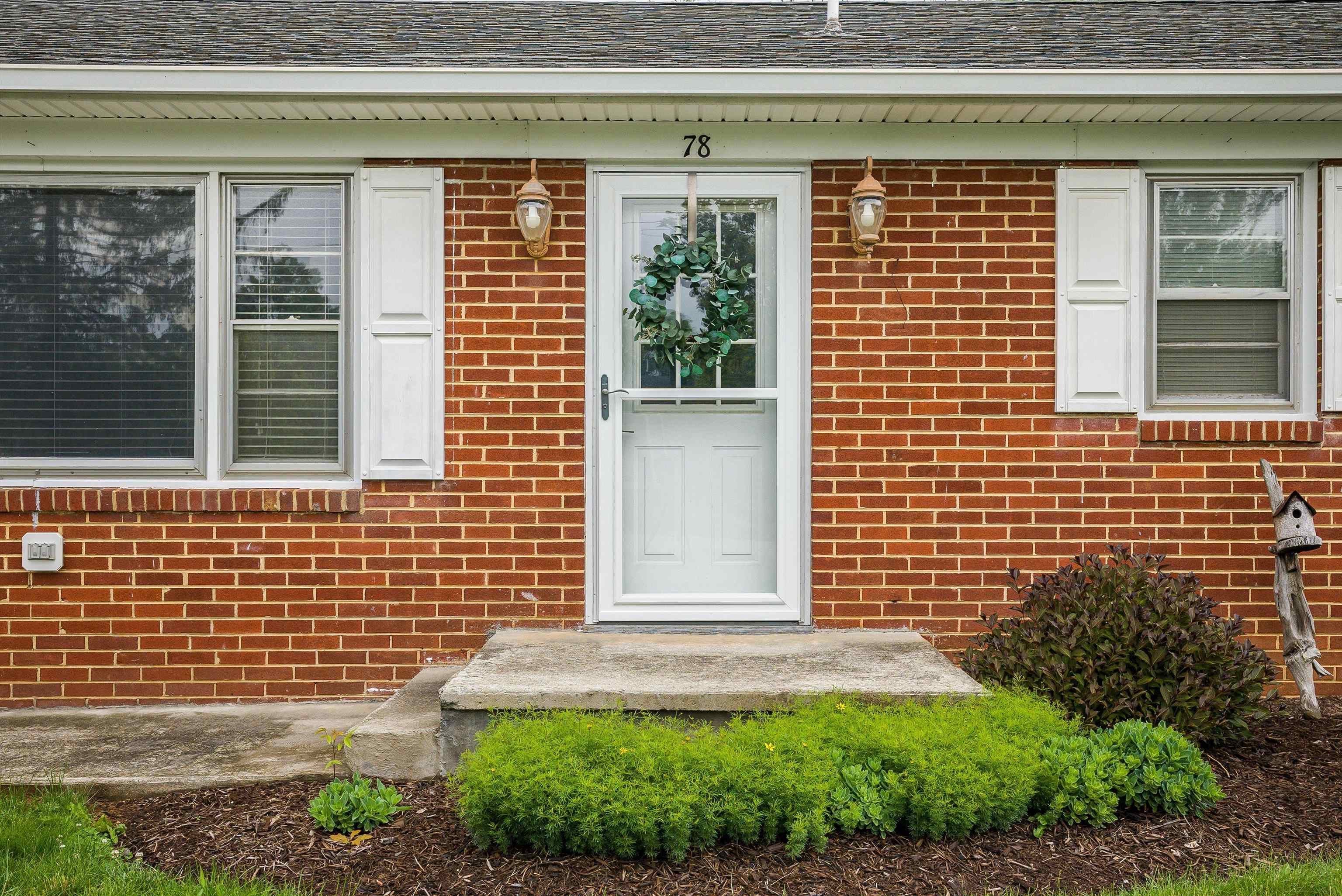 78 Stuart Avenue Stuarts Draft, VA 24477 - Photo 6 of 41 a front view of a house with a yard