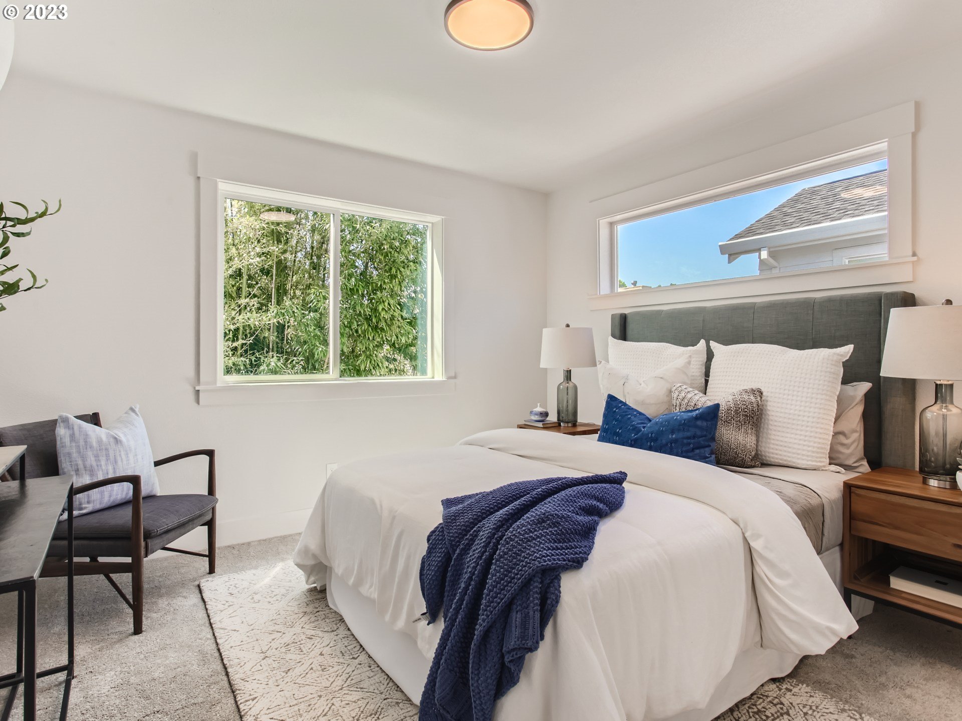 3134 North Winchell Street, Unit B Portland, OR 97217 - Photo 15 of 24 a bedroom with bed and a window