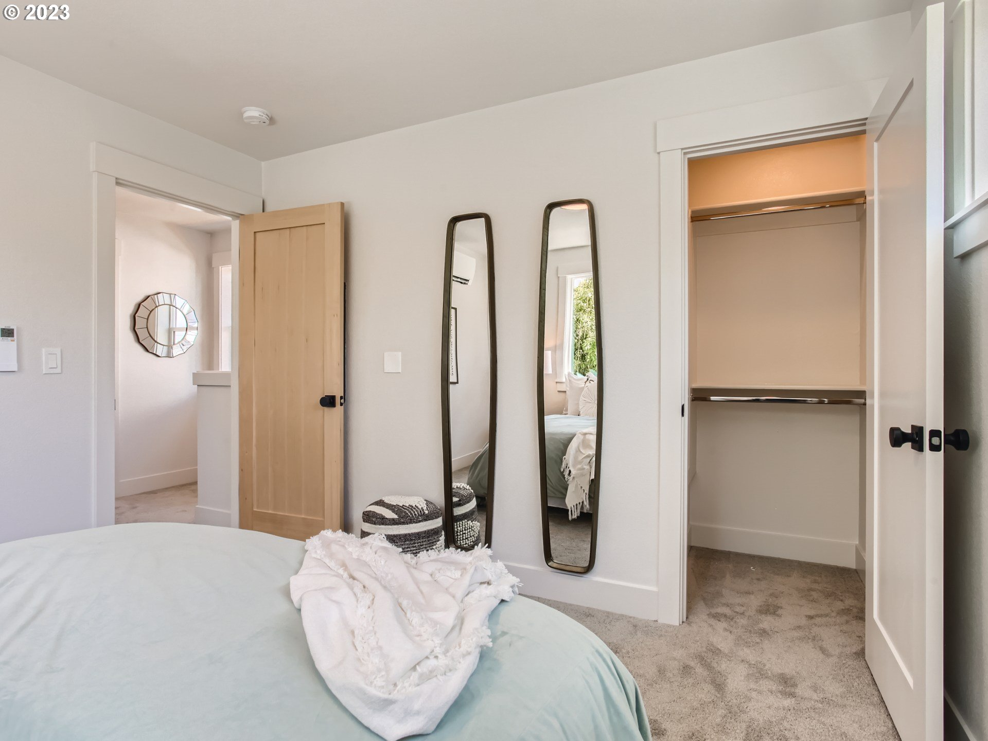 3134 North Winchell Street, Unit B Portland, OR 97217 - Photo 20 of 24 a bedroom with a bed and a dresser