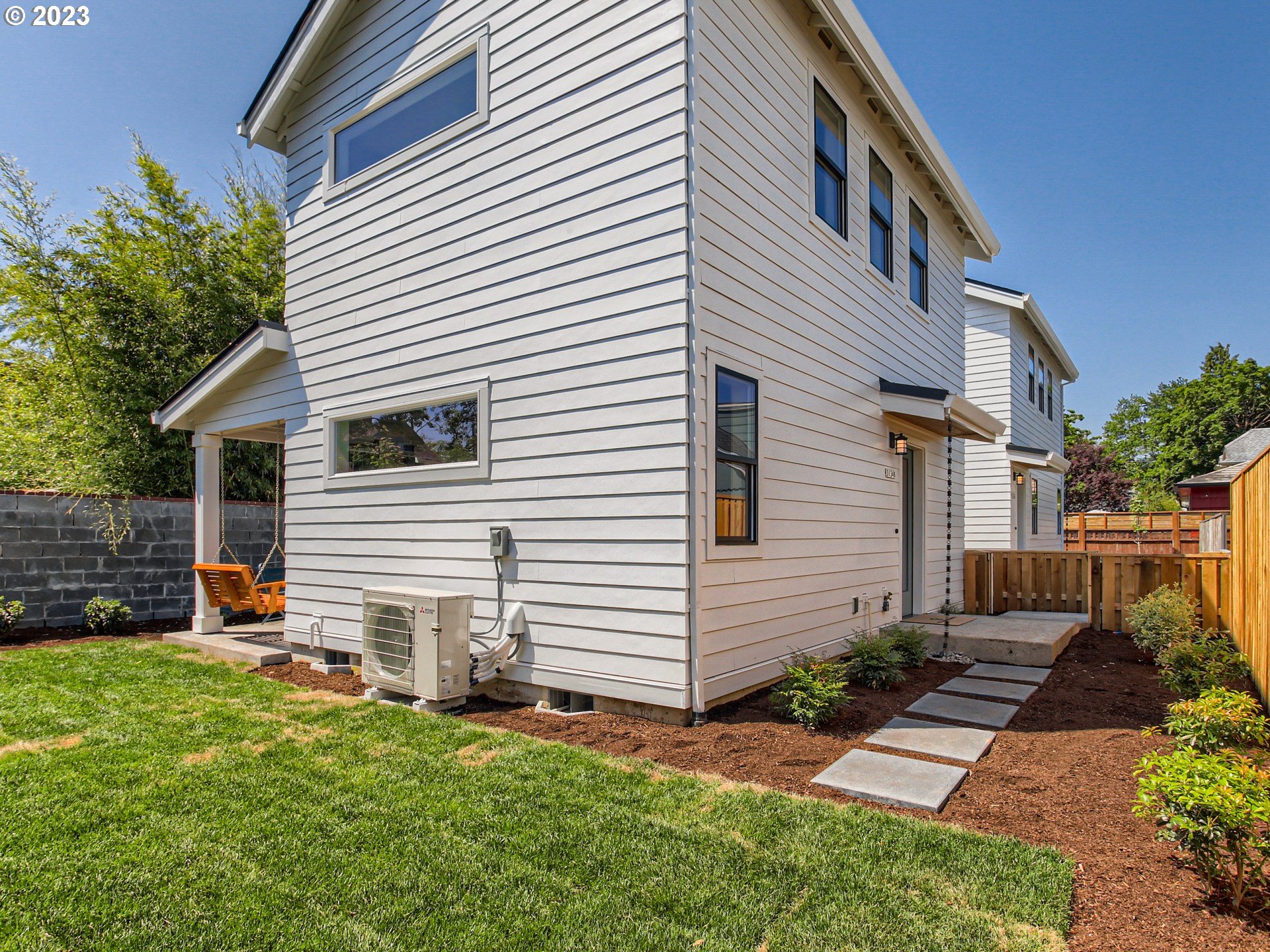 3134 North Winchell Street, Unit B Portland, OR 97217 - Photo 4 of 24 a view of a house with a yard