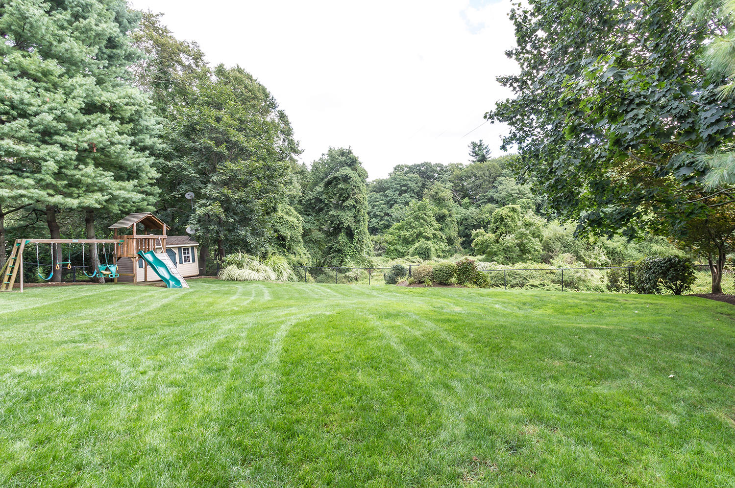 14 Chasmars Pond Road Darien, CT 06820 - Photo 2 of 34 a view of a house with a yard