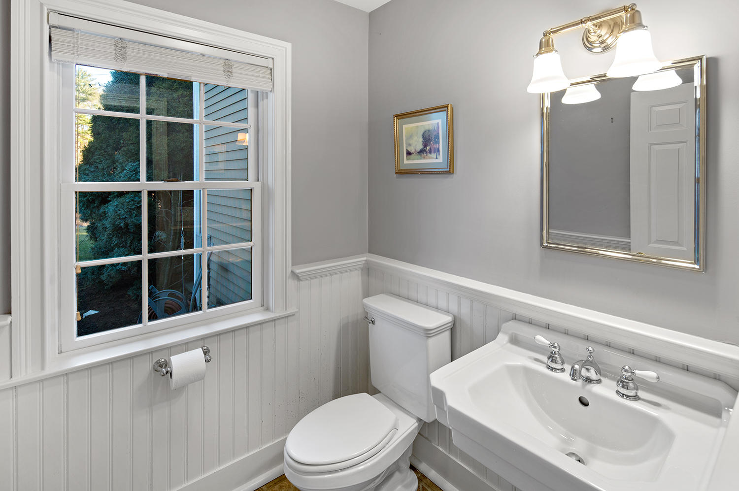 14 Chasmars Pond Road Darien, CT 06820 - Photo 14 of 34 a bathroom with a sink a toilet and shower