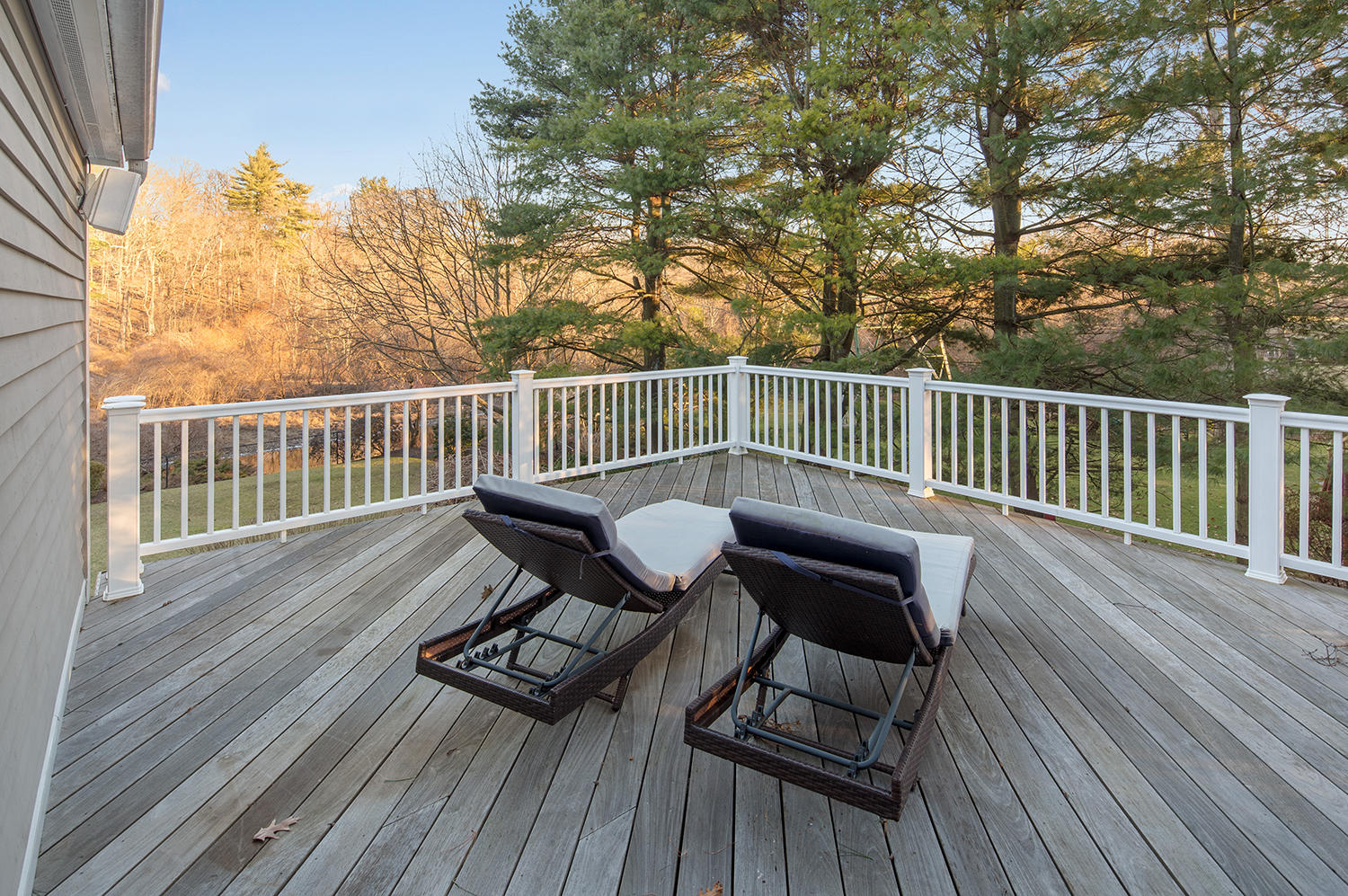 14 Chasmars Pond Road Darien, CT 06820 - Photo 19 of 34 a view of balcony with wooden floor and outdoor seating