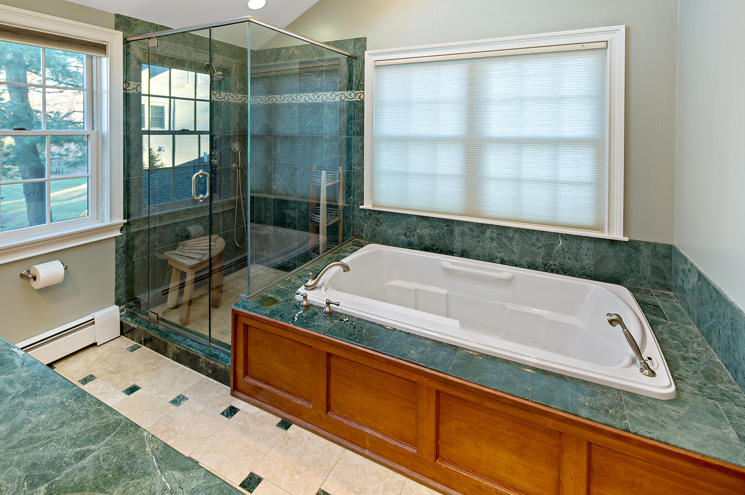 14 Chasmars Pond Road Darien, CT 06820 - Photo 21 of 34 a bath tub sitting next to a window