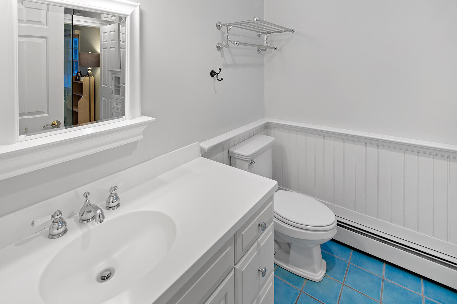 14 Chasmars Pond Road Darien, CT 06820 - Photo 26 of 34 a bathroom with a sink and a toilet