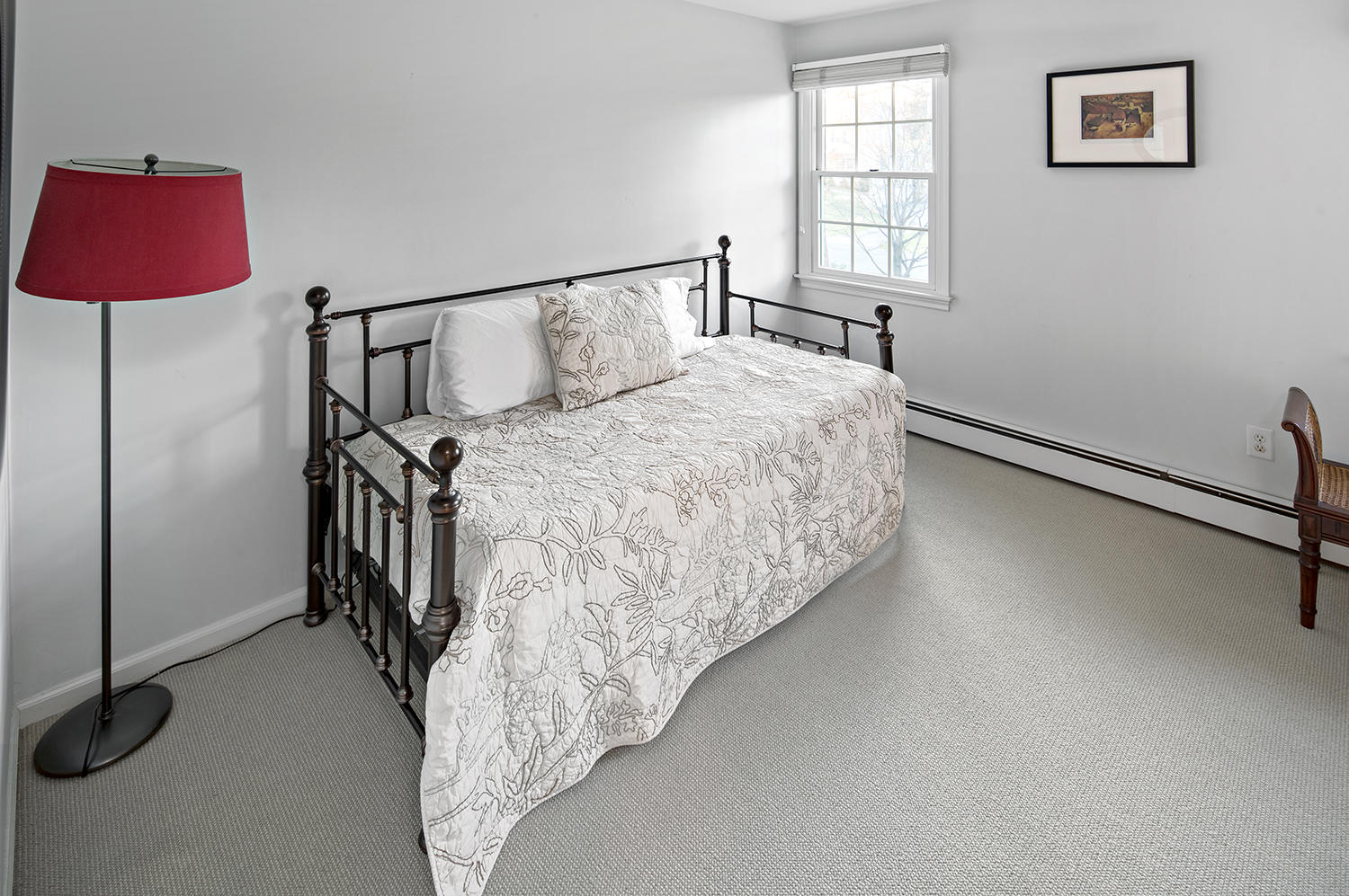 14 Chasmars Pond Road Darien, CT 06820 - Photo 27 of 34 a bedroom with a bed and a window