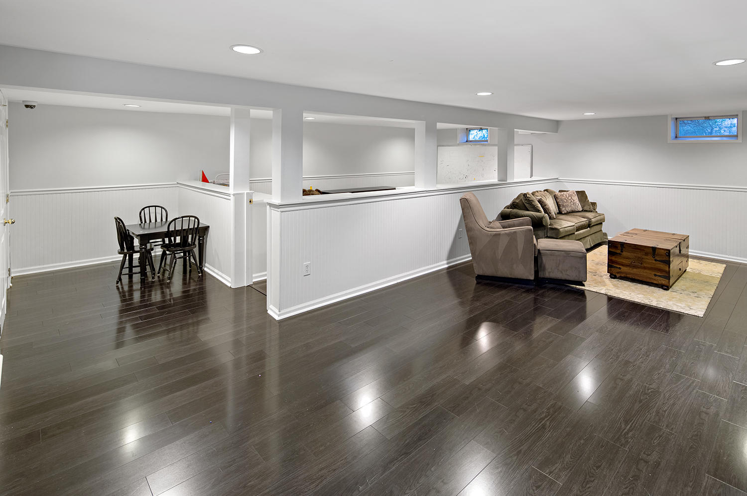 14 Chasmars Pond Road Darien, CT 06820 - Photo 28 of 34 a living room with furniture and a table