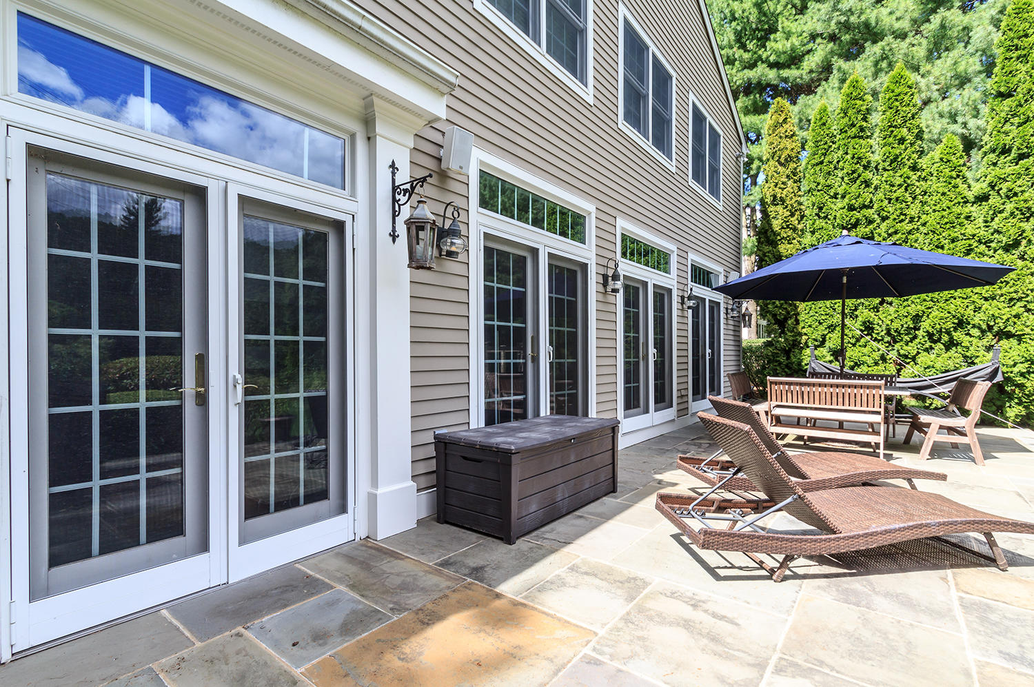 14 Chasmars Pond Road Darien, CT 06820 - Photo 30 of 34 a view of a house with backyard and sitting area