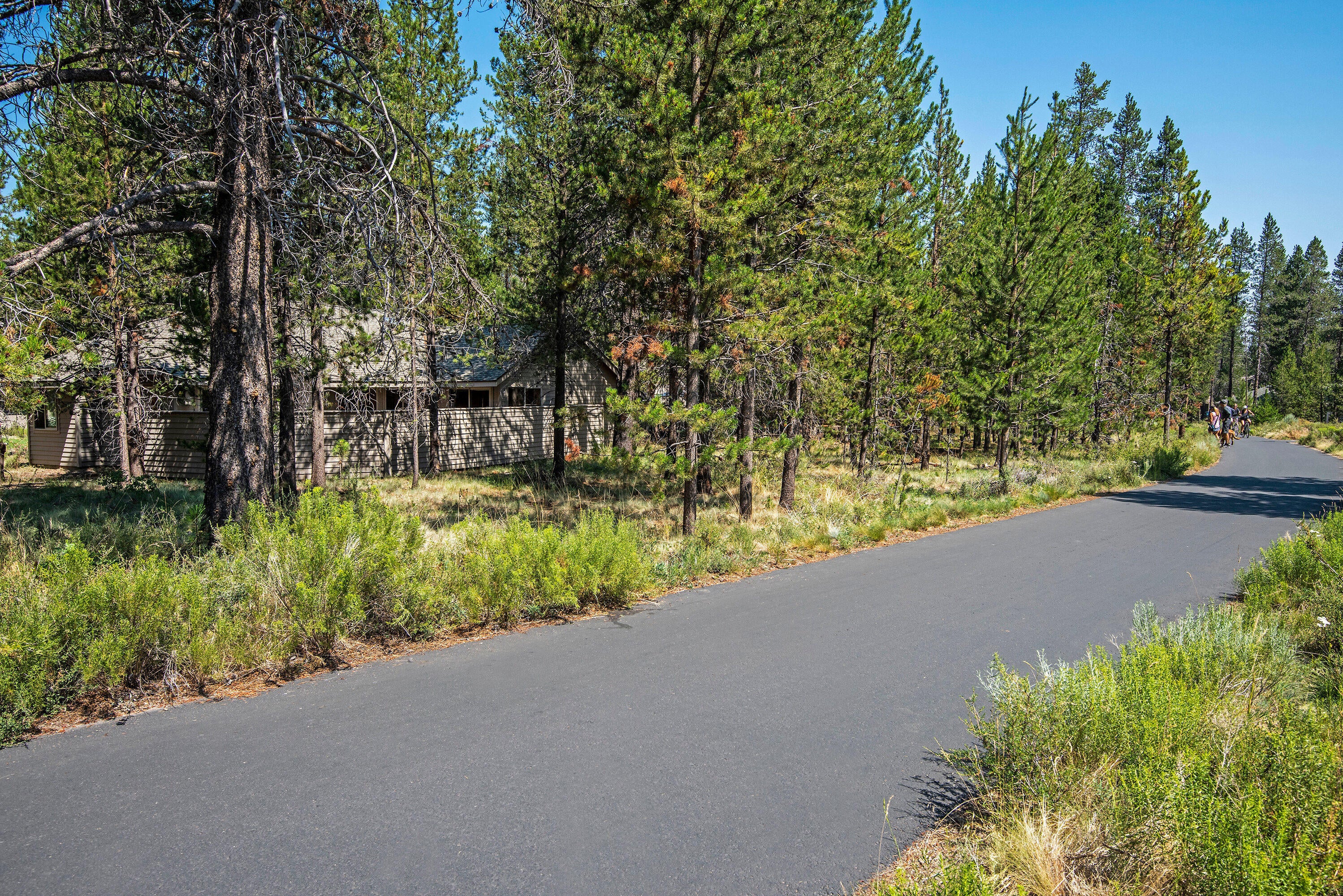 57700 Filbert Lane, Unit 5 Sunriver, OR 97707 - Photo 17 of 18 Convenient bike path from the back yard.