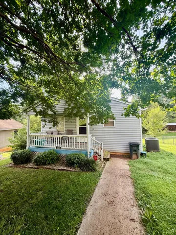a view of a park next to a yard