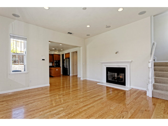 111 Alvo Court San Ramon, CA 94582 - Photo 6 of 17 a view of an empty room with window and wooden floor