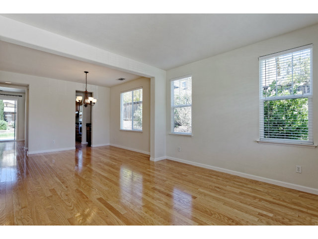 111 Alvo Court San Ramon, CA 94582 - Photo 7 of 17 a view of an empty room with window and wooden floor