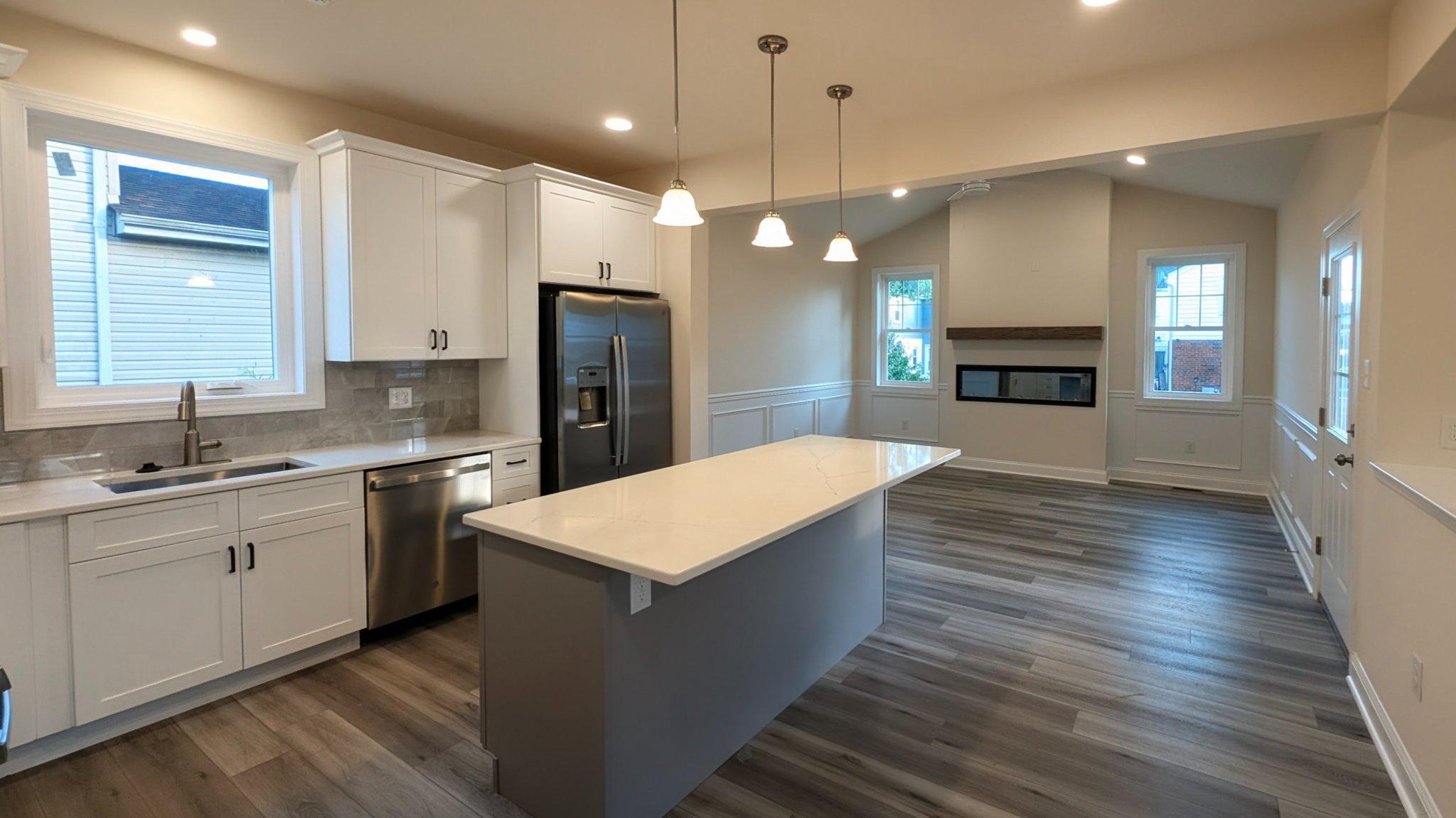425 Rutledge Avenue Folsom, PA 19033 - Photo 14 of 33 Contrasting freestanding island w/ quartz counter.
