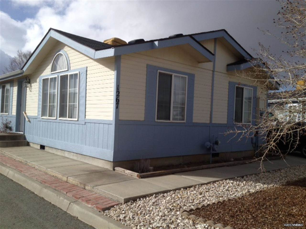 1267 Lynx Street Reno, NV 89506 - Photo 1 of 1 a view of a house with a yard