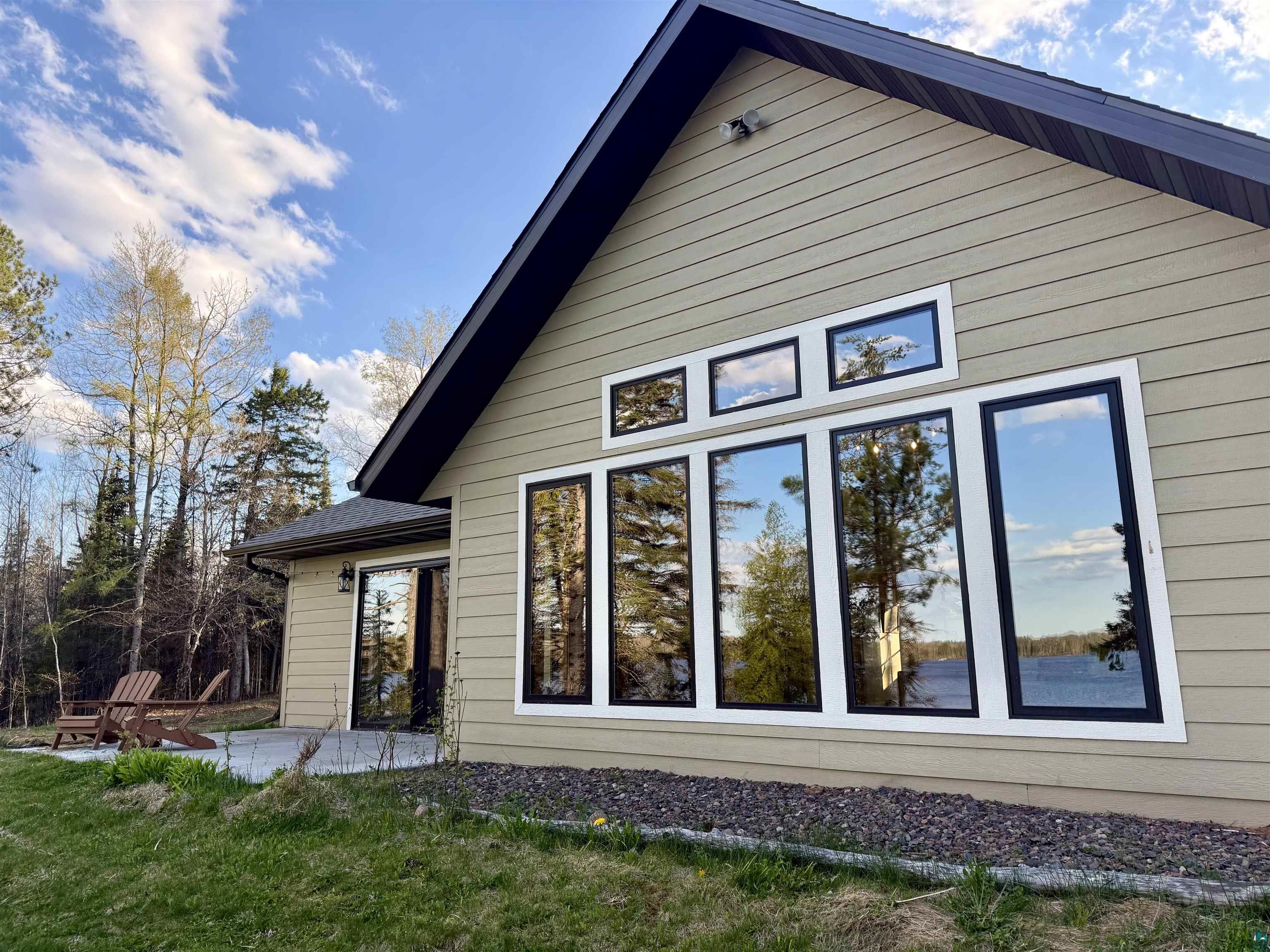 5274 Marble Lake Road Two Harbors, MN 55616 - Photo 56 of 79 Contemporary exterior with horizontal siding and a dark shingle roof