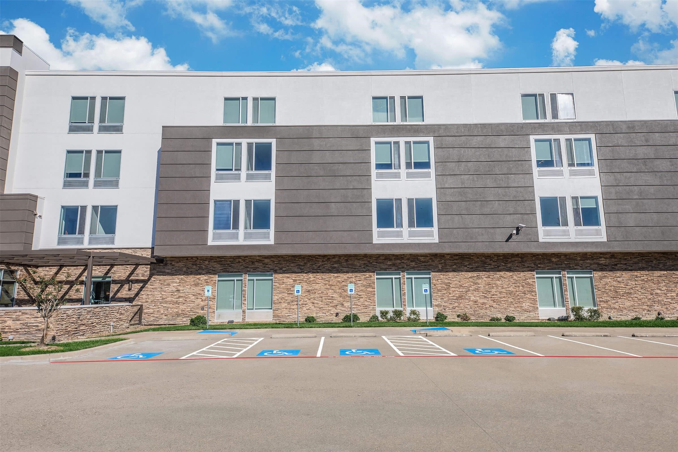 1350 Broadfield Boulevard, Unit 433 Houston, TX 77084 - Photo 21 of 29 a front view of a building with many windows