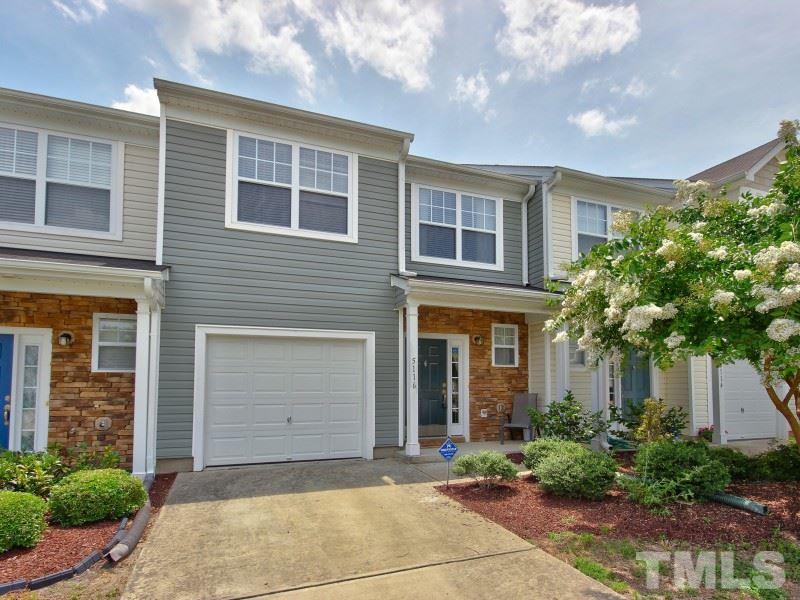 5116 Sandy Banks Road Raleigh, NC 27616 - Photo 1 of 21 a front view of a house with a yard and garage