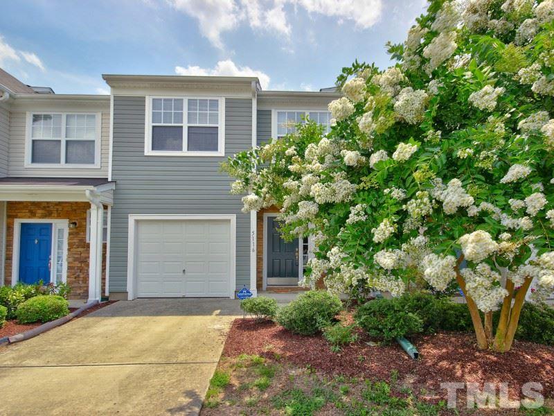 5116 Sandy Banks Road Raleigh, NC 27616 - Photo 2 of 21 a view of a house with a tree and flower plants