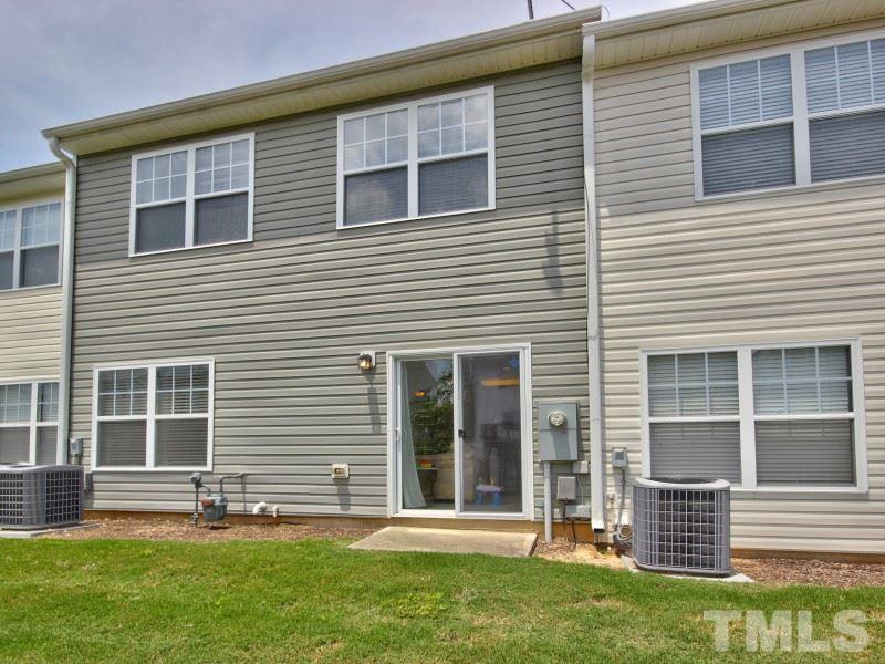 5116 Sandy Banks Road Raleigh, NC 27616 - Photo 20 of 21 a front view of a house with a yard