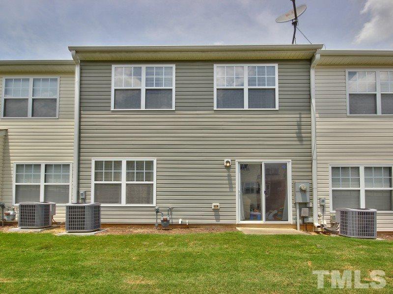 5116 Sandy Banks Road Raleigh, NC 27616 - Photo 21 of 21 a front view of a house with a yard