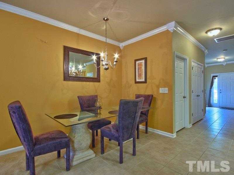 5116 Sandy Banks Road Raleigh, NC 27616 - Photo 9 of 21 a view of a workspace with furniture
