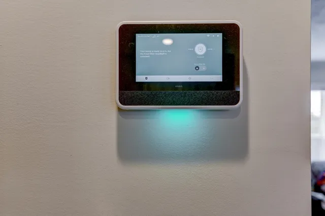 a view of a hallway with closet and a livingroom view