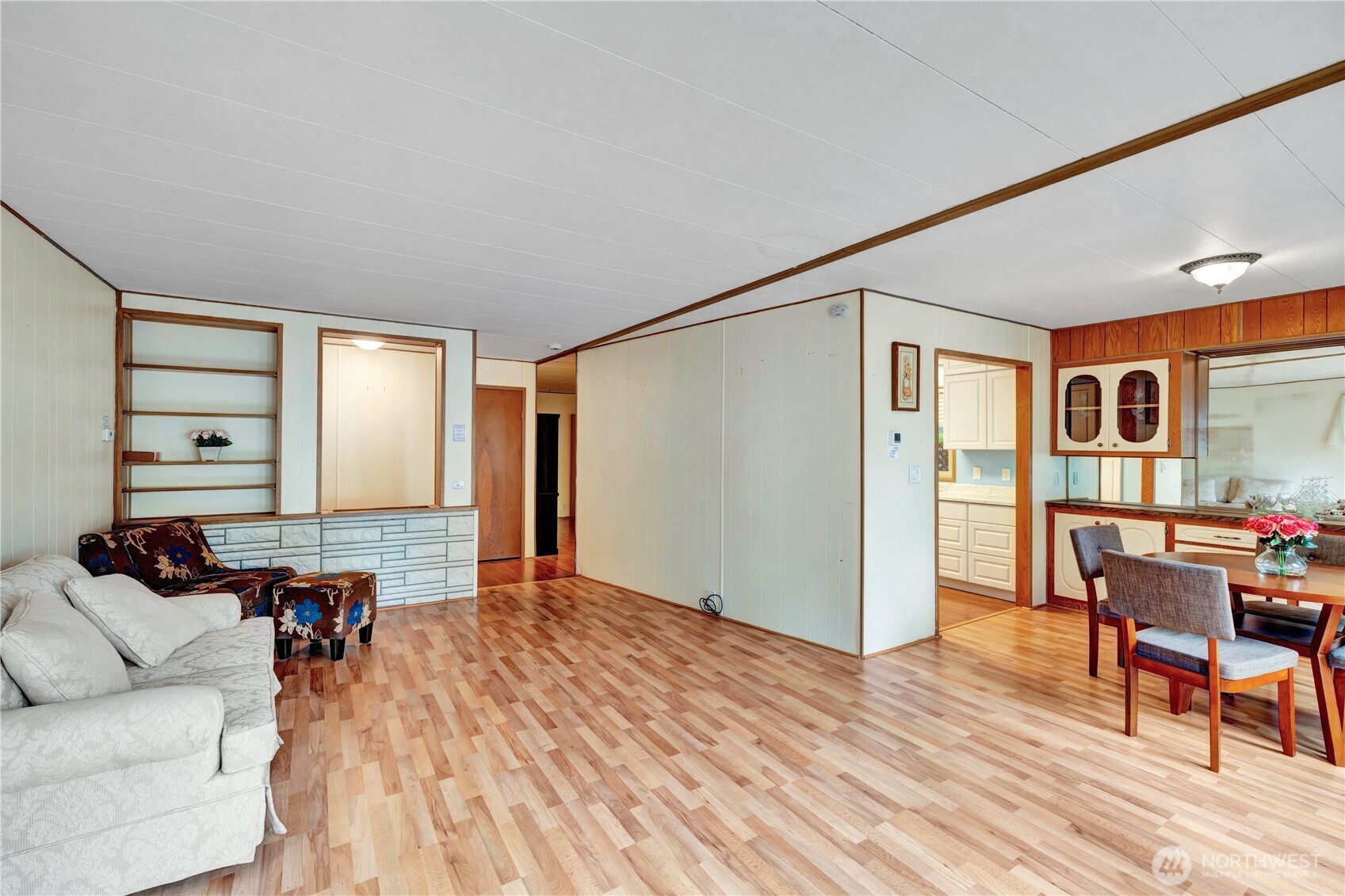 18425 Northeast 95th Street, Unit 110 Redmond, WA 98052 - Photo 4 of 25 a living room with furniture and wooden floor