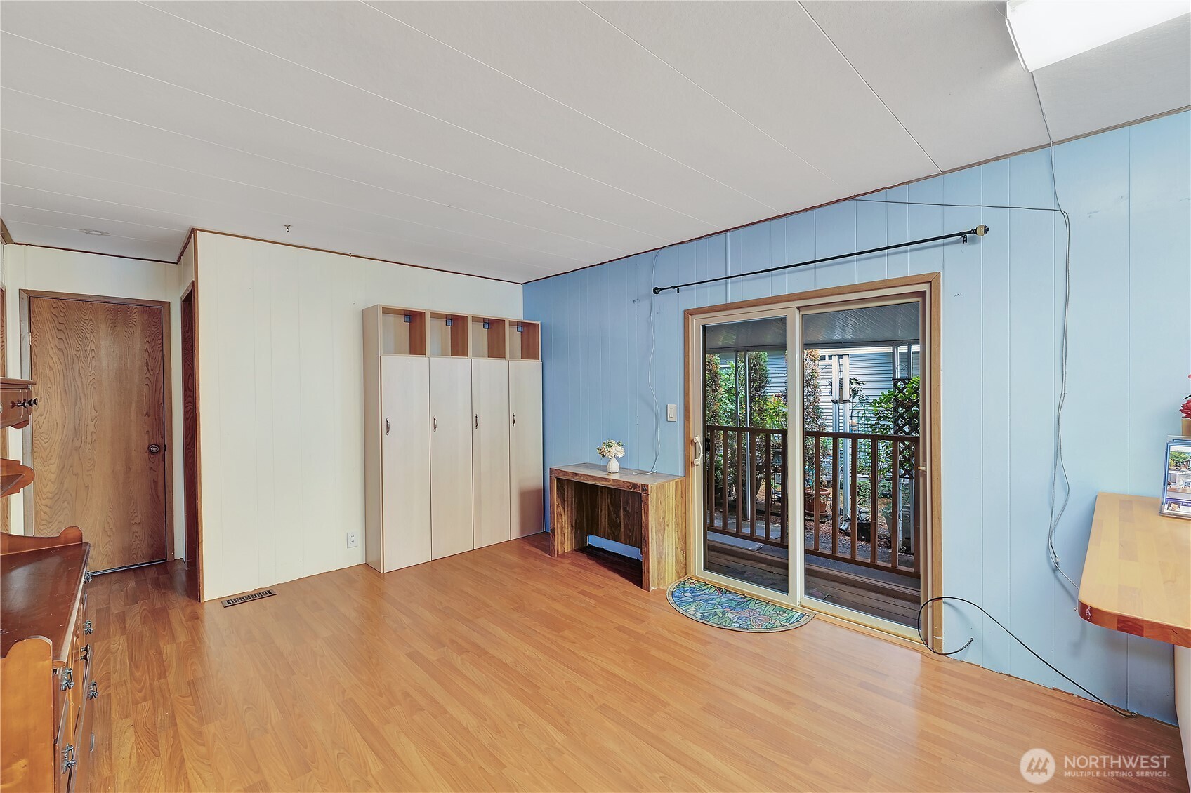 18425 Northeast 95th Street, Unit 110 Redmond, WA 98052 - Photo 8 of 25 a bedroom with a bed closet and a large window