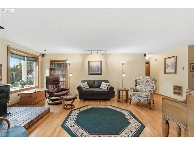 a living room with furniture and a table