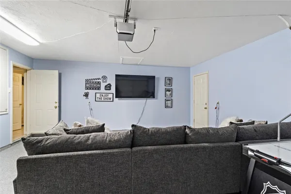 a living room with furniture and a table