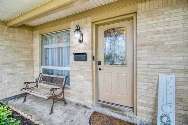 a bench and bench in front of a door