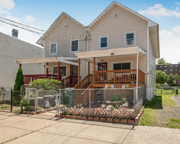 front view of a house with a small yard