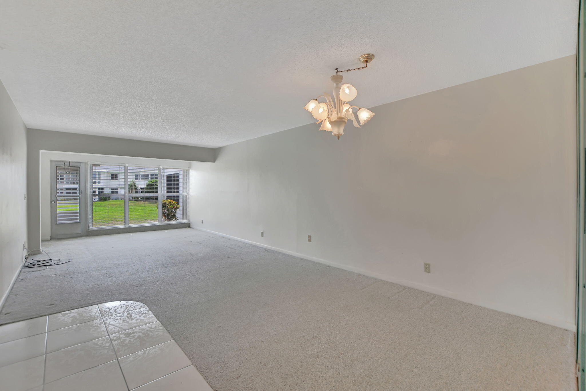 2830 Southwest 13th Street, Unit 101 Delray Beach, FL 33445 - Photo 11 of 56 Living/Dining Areas