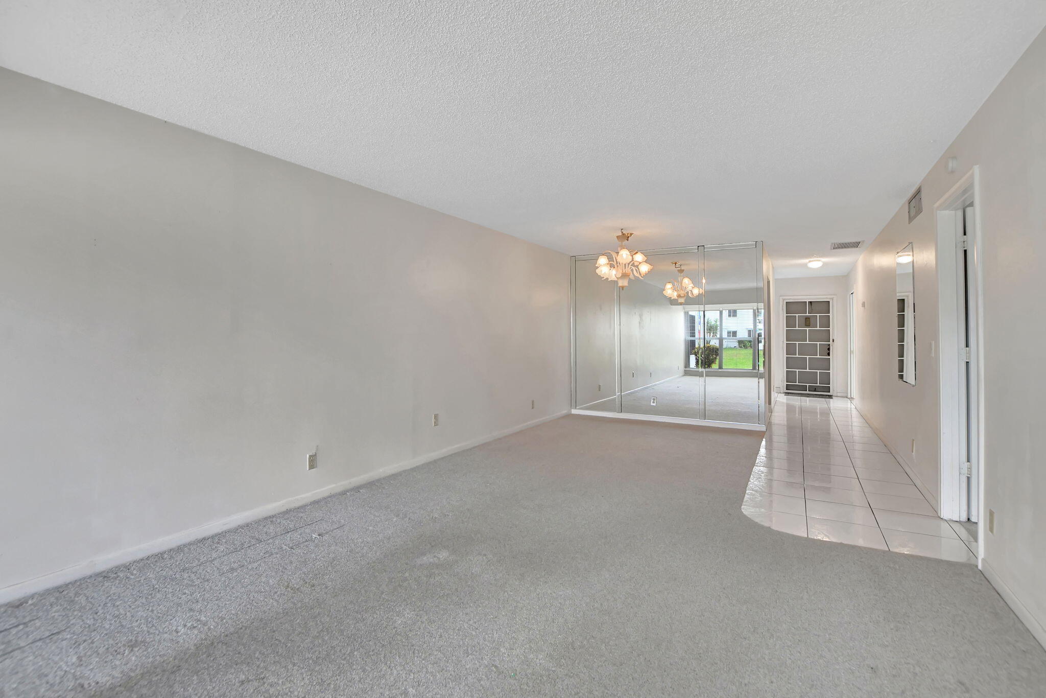 2830 Southwest 13th Street, Unit 101 Delray Beach, FL 33445 - Photo 15 of 56 Living/Dining Areas