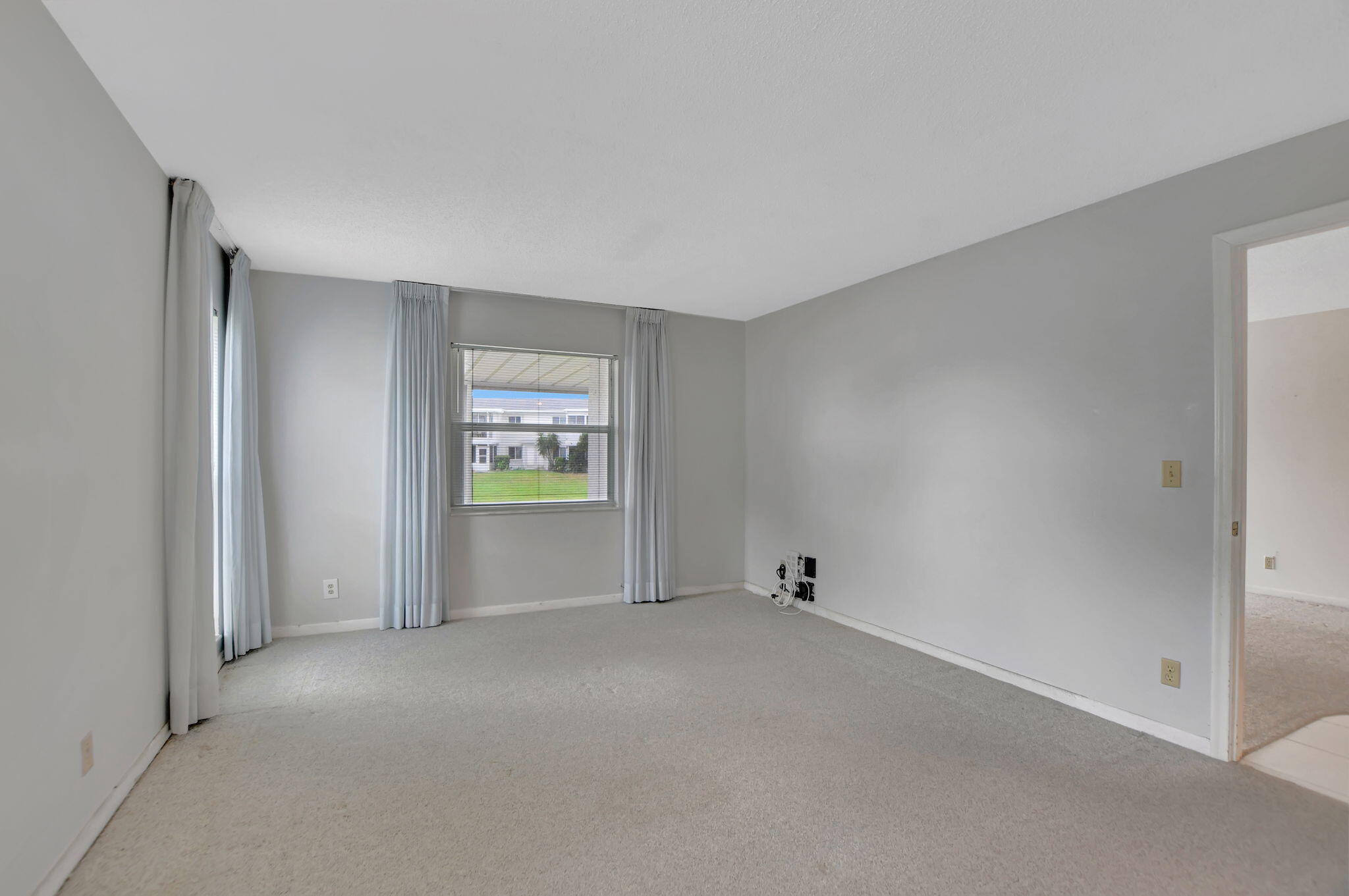 2830 Southwest 13th Street, Unit 101 Delray Beach, FL 33445 - Photo 19 of 56 Primary Bedroom