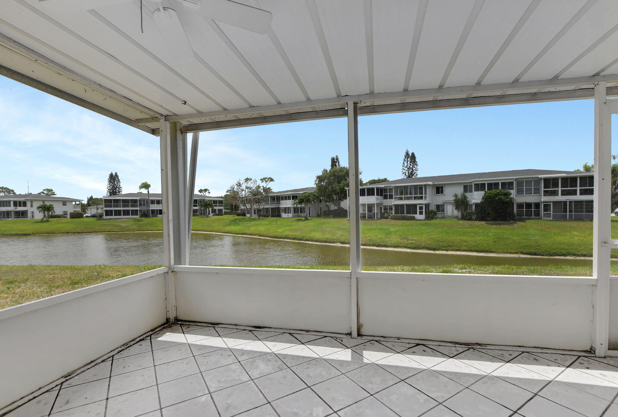 2830 Southwest 13th Street, Unit 101 Delray Beach, FL 33445 - Photo 30 of 56 Screened Patio