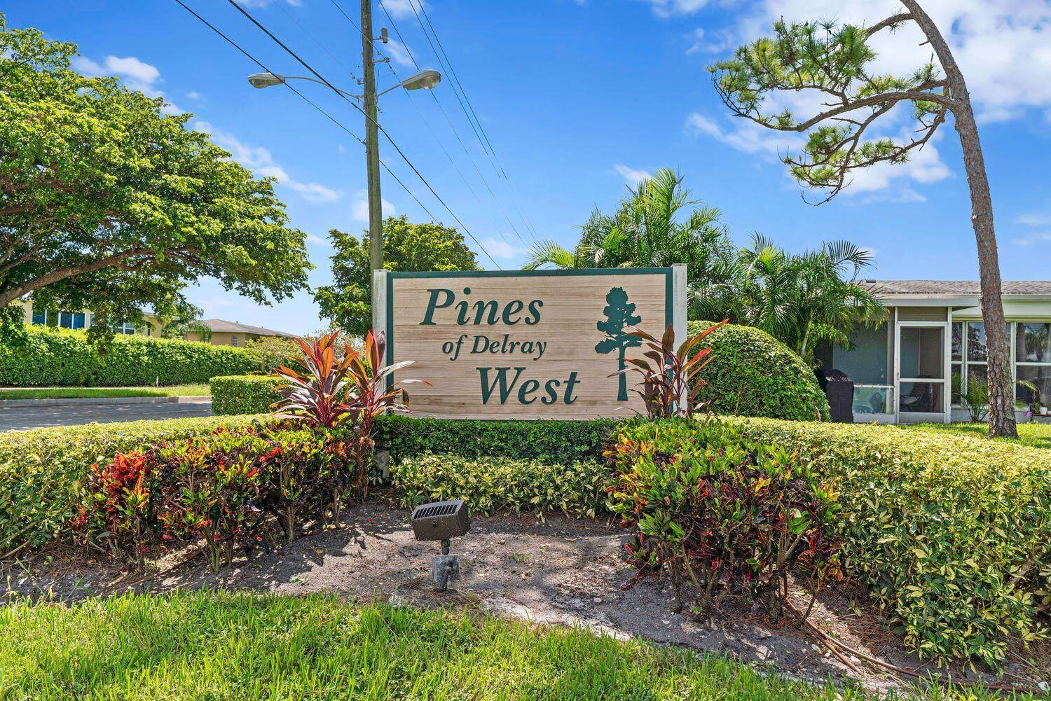 2830 Southwest 13th Street, Unit 101 Delray Beach, FL 33445 - Photo 33 of 56 Pines sign