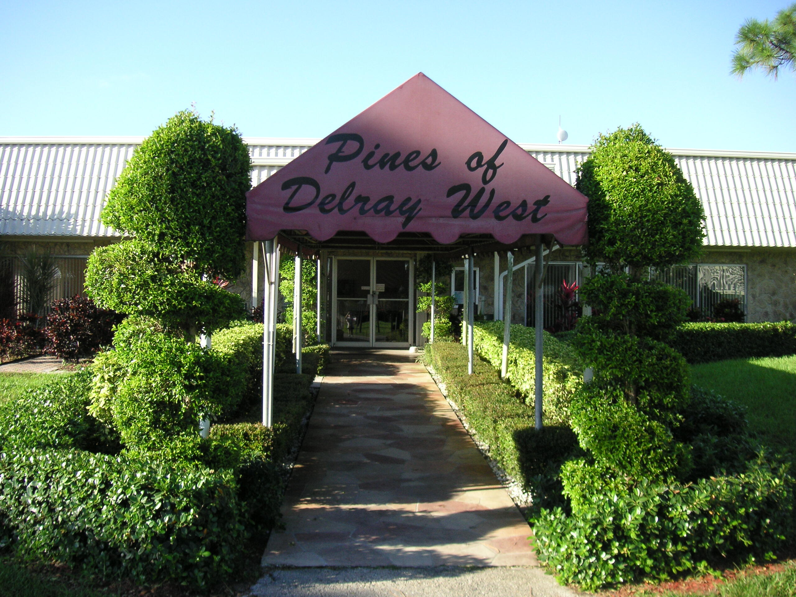 2830 Southwest 13th Street, Unit 101 Delray Beach, FL 33445 - Photo 34 of 56 Clubhouse front
