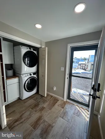 a view of a washer and dryer in a room