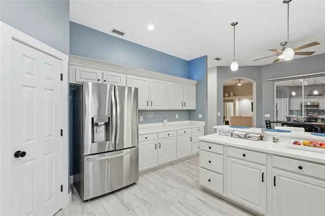 a view of a bedroom with furniture window and wooden floor