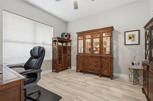 a bedroom with a bed and furniture