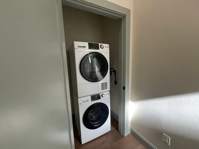 a utility room with dryer and washer