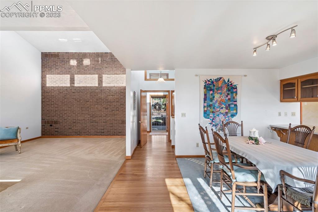 1711 Columbine Road Colorado Springs, CO 80907 - Photo 6 of 50 a view of a dining room with furniture