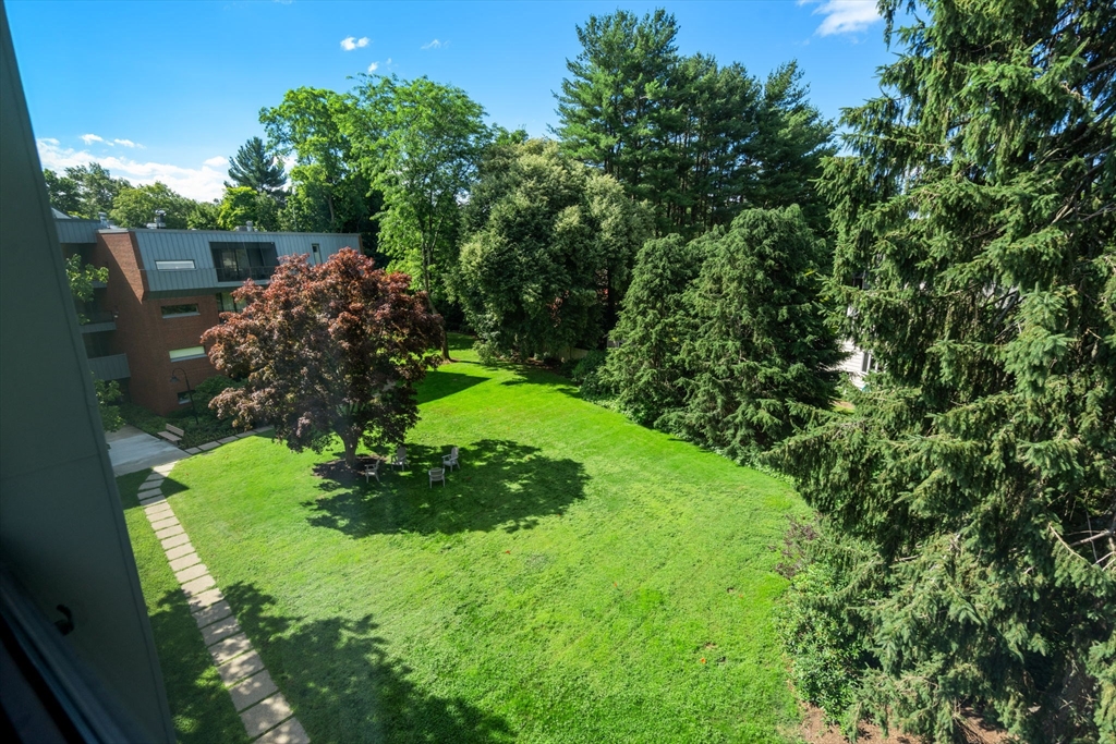 75 Grove Street, Unit 429 Wellesley, MA 02482 - Photo 17 of 22 a view of a garden