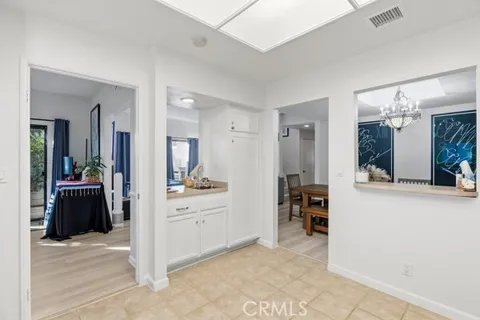 a view of living room and kitchen