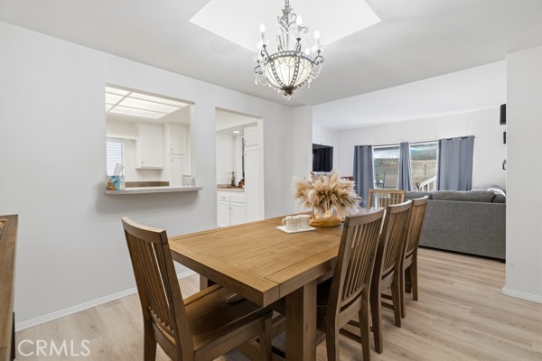 442 Walker Road San Dimas, CA 91773 - Photo 18 of 48 a view of a dining room with furniture window and wooden floor