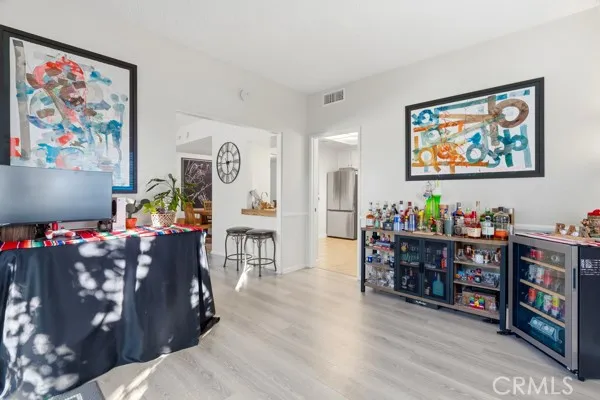 a bathroom with a toilet a sink and a mirror