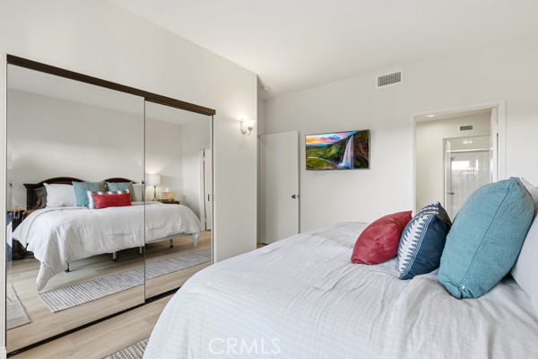 442 Walker Road San Dimas, CA 91773 - Photo 29 of 48 a bedroom with a bed and a large mirror